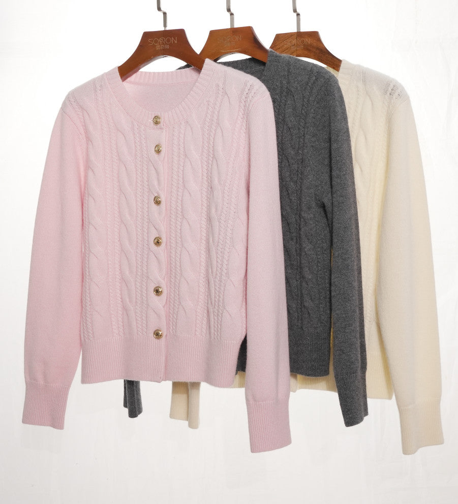 Amoer couture twist pattern cashmere sweater in pink, gray, and cream options with button closure