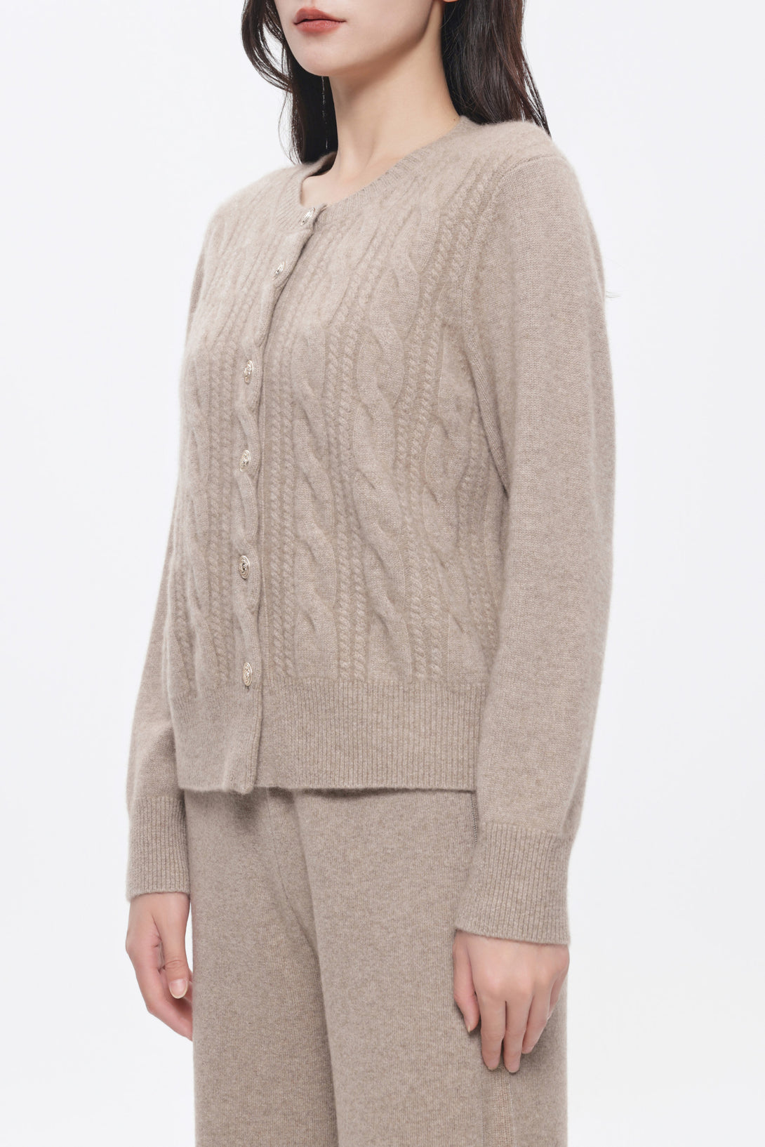 Amoer Couture twist pattern cashmere sweater featuring a button-up front and cozy fit in a neutral tone