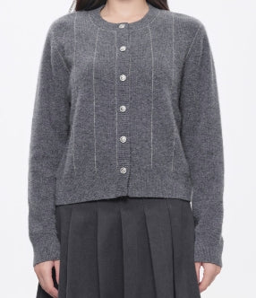 Amoer couture luxury round-neck cardigan in gray with button closure and subtle striping design