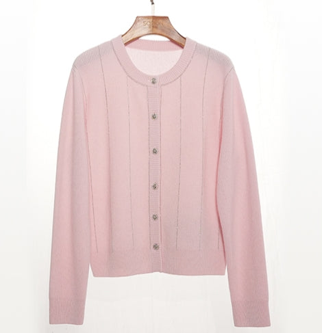 Amoer couture luxury round-neck cardigan in soft pink with button closure and ribbed detail