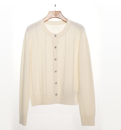 Amoer Couture luxury round-neck cardigan in cream with button closure and ribbed design